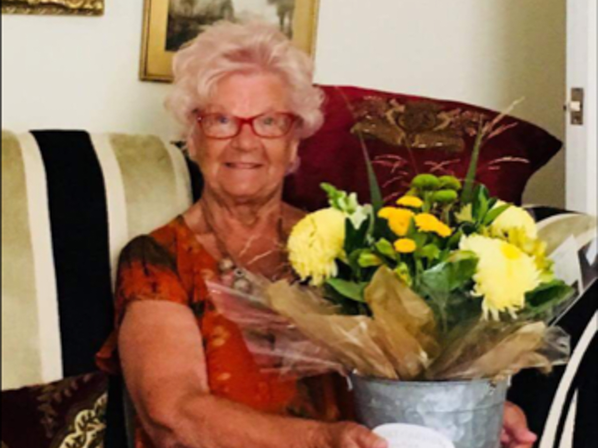 Betty Retford volunteer with flowers-September2018