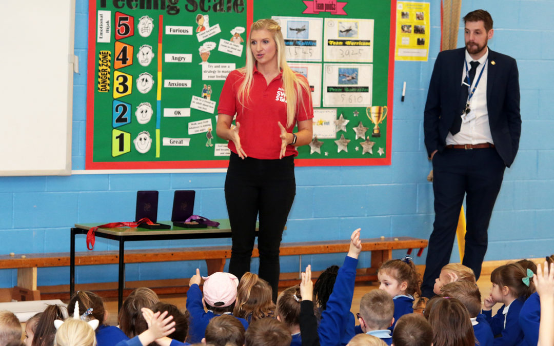 Four-time Olympic medallist delivers to Benjamin Adlard pupils after banner competition win