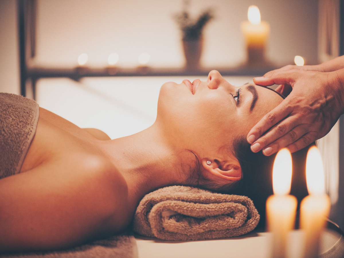 Spa woman Massage. Face Massage in beauty spa salon. Female enjo