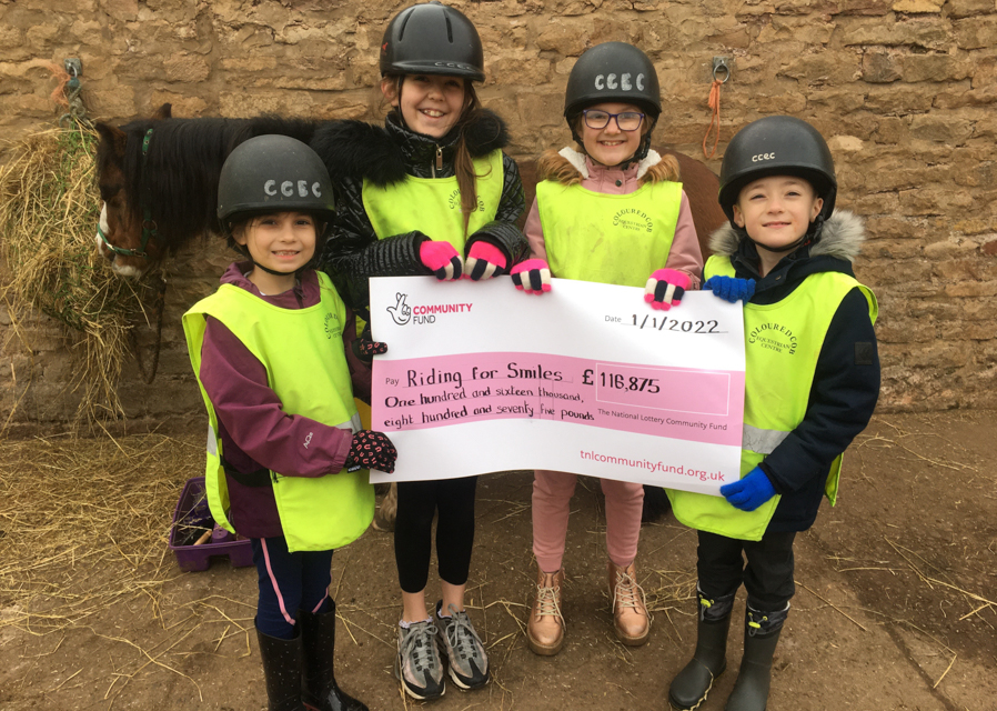 Riding for Smiles celebrates after receiving National Lottery funding